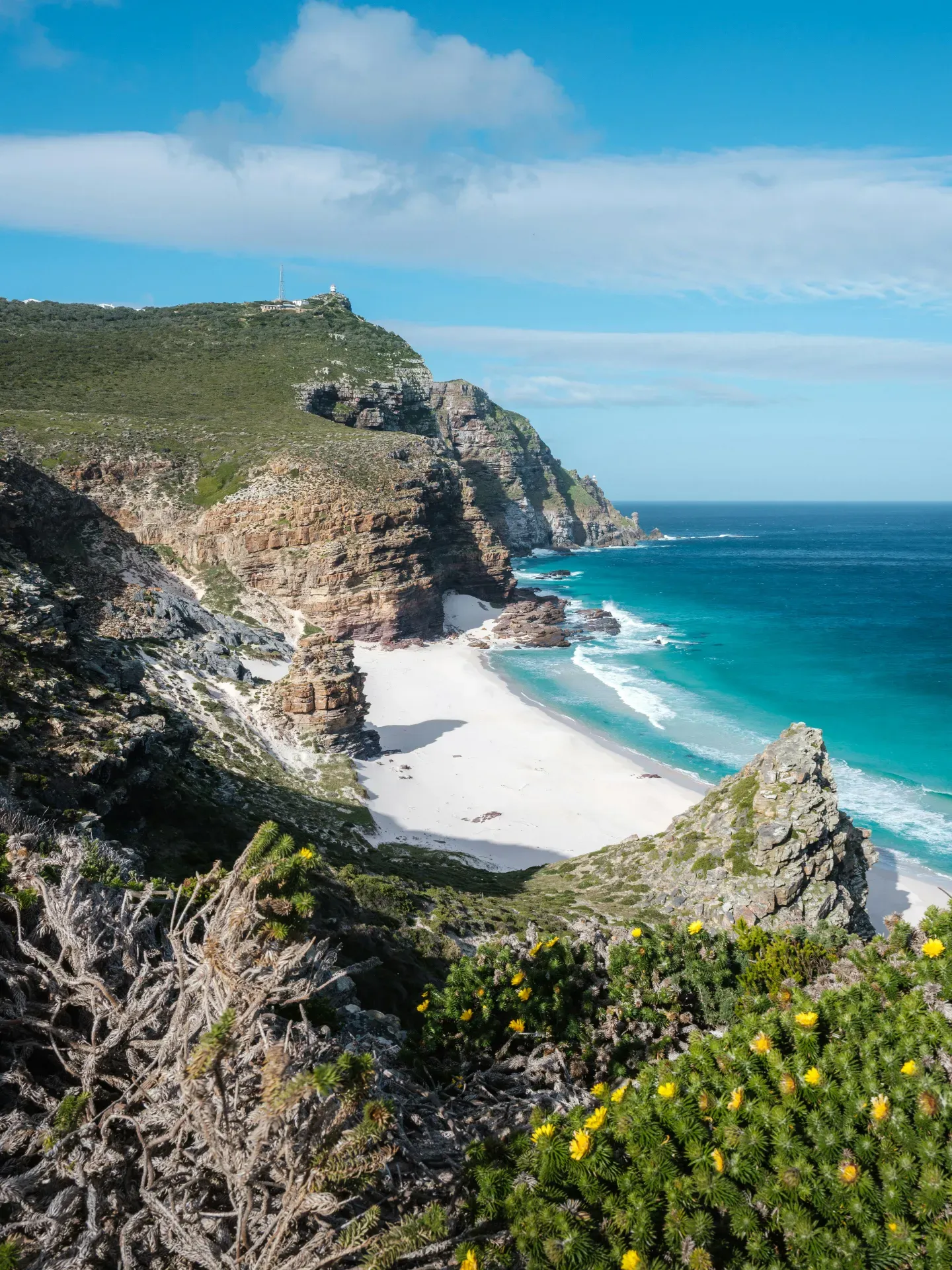 Cape Point lighthouse and dramatic cliffs - southwesternmost tip of Africa